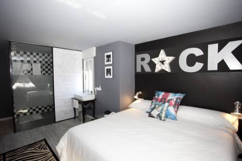 Imagen de la habitación del Hotel Apartamentos Rock Star. Foto 12