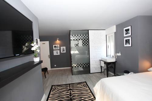 Imagen de la habitación del Hotel Apartamentos Rock Star. Foto 16