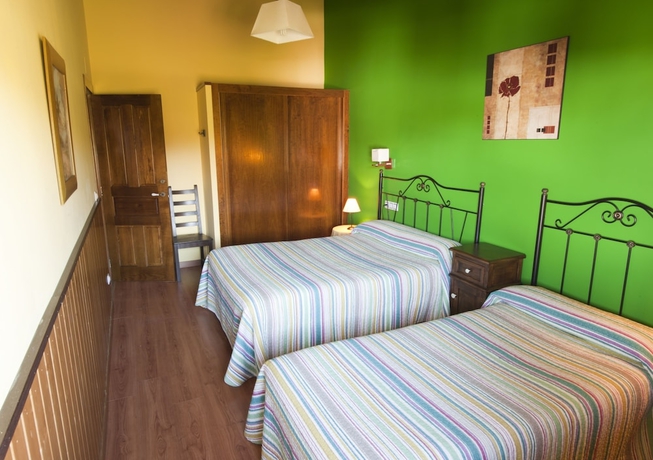 Imagen de la habitación del Hotel Apartamentos Rurales Villa De Saín. Foto 2