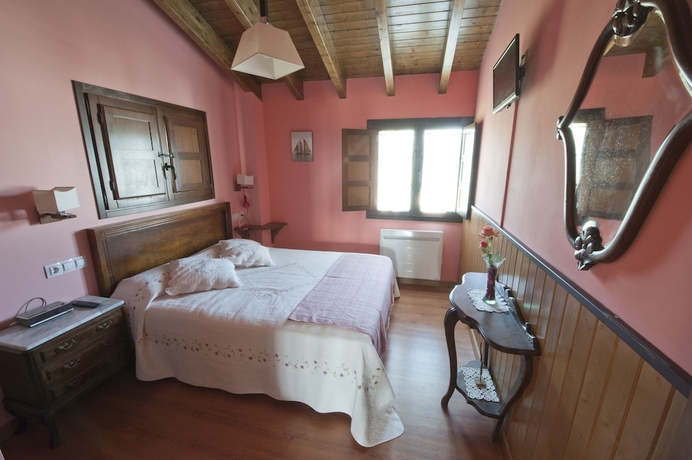 Imagen de la habitación del Hotel Apartamentos Rurales Villa De Saín. Foto 5