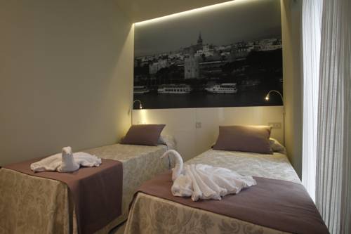 Imagen de la habitación del Hotel Apartamentos Sevilla Centro. Foto 3