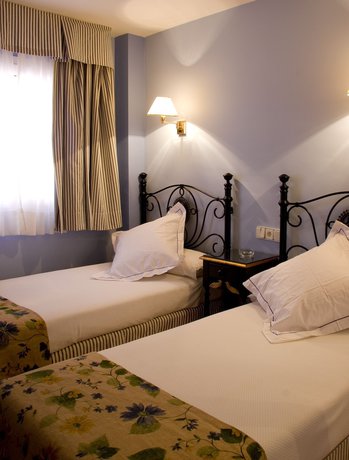 Imagen de la habitación del Hotel Apartamentos Soho Boutique Vistahermosa. Foto 19