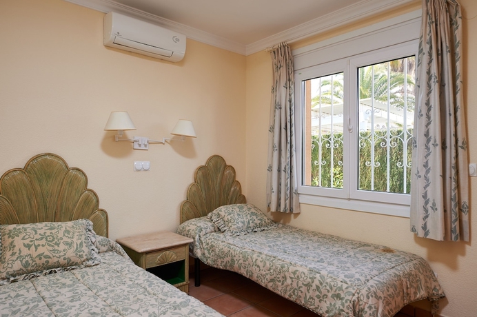 Imagen de la habitación del Hotel Apartamentos y Villas Oliva Nova Golf. Foto 2