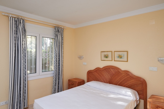 Imagen de la habitación del Hotel Apartamentos y Villas Oliva Nova Golf. Foto 5