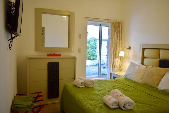 Imagen de la habitación del Hotel Apartaments At Cadaques Caribe. Foto 5