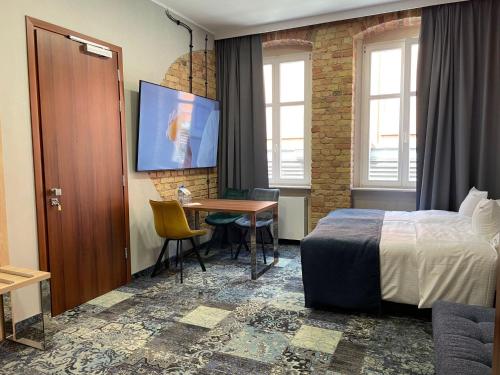 Imagen de la habitación del Hotel Apartamenty Browar Old Town Poznań Check In 24h. Foto 16