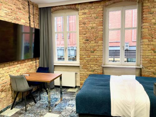 Imagen de la habitación del Hotel Apartamenty Browar Old Town Poznań Check In 24h. Foto 18
