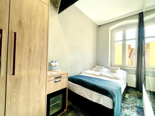 Imagen de la habitación del Hotel Apartamenty Browar Old Town Poznań Check In 24h. Foto 19