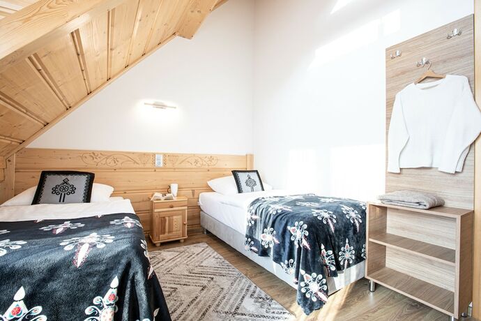 Imagen de la habitación del Hotel Apartamenty Domki Giewont. Foto 15