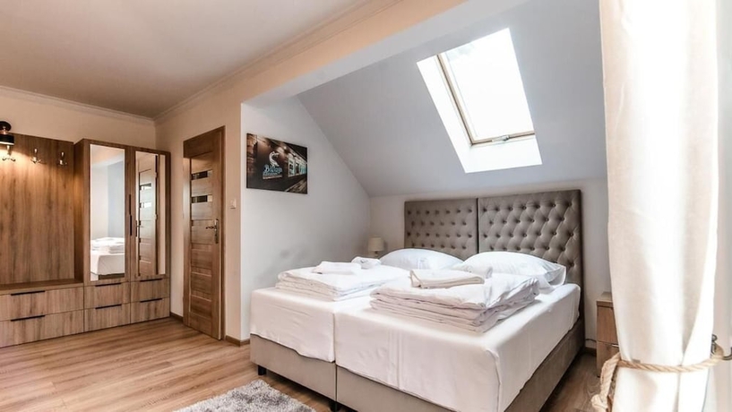 Imagen de la habitación del Hotel Apartamenty Kapitańskie. Foto 12