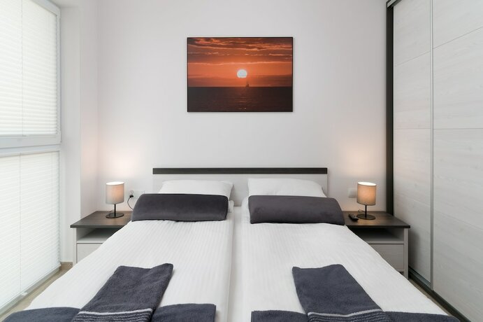 Imagen de la habitación del Hotel Apartamenty Lambert. Foto 17