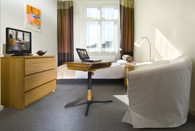 Imagen de la habitación del Hotel Apartamenty Pomarańczarnia. Foto 17