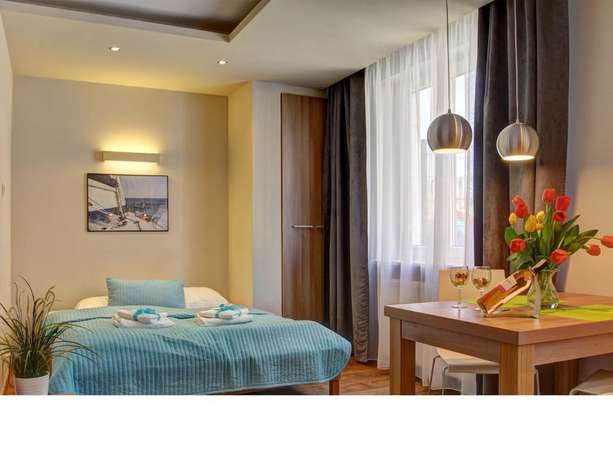Imagen de la habitación del Hotel Apartamenty w Marina Jastarnia. Foto 17