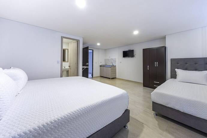 Imagen de la habitación del Hotel Apartasuite Galery FC. Foto 16