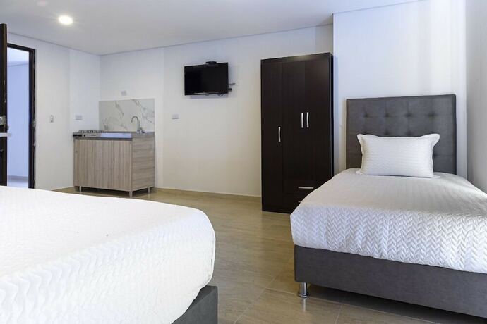 Imagen de la habitación del Hotel Apartasuite Galery FC. Foto 17