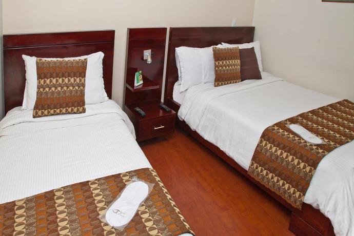 Imagen de la habitación del Hotel Aparta-suites Mirador Del Recuerdo. Foto 7