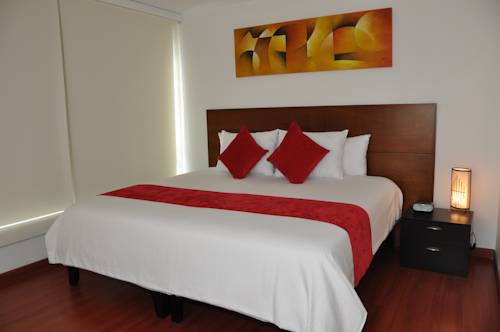 Imagen de la habitación del Hotel Apartasuites Plaza Modelia. Foto 2