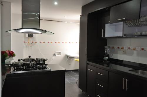 Imagen de la habitación del Hotel Apartasuites Plaza Modelia. Foto 4