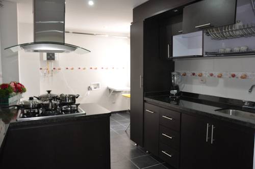 Imagen de la habitación del Hotel Apartasuites Plaza Modelia. Foto 5
