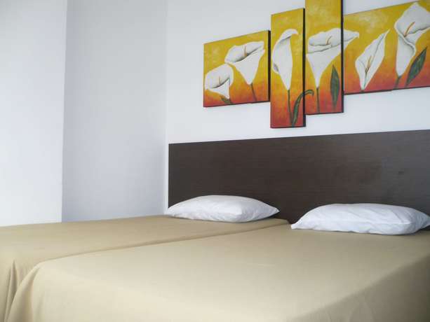 Imagen de la habitación del Hotel Apartasuites San Marcos. Foto 10