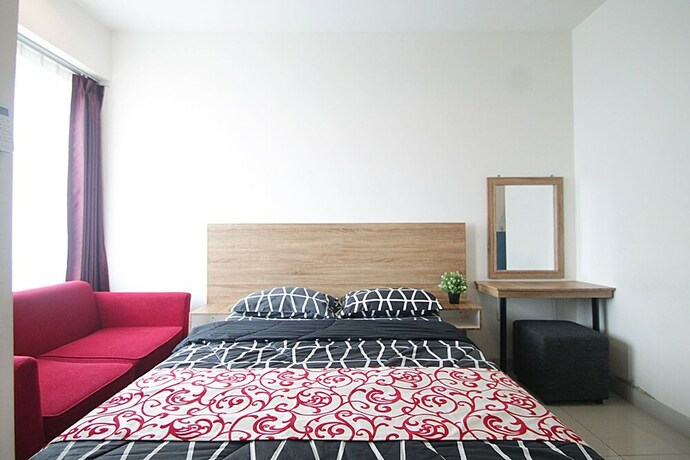 Imagen de la habitación del Hotel Apartemen Grand Kamala Lagoon By Aparian. Foto 25