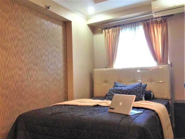 Imagen de la habitación del Hotel Apartemen Mutiara Bekasi By Veeroom. Foto 18