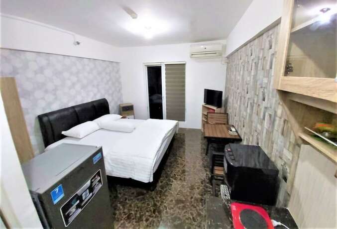 Imagen de la habitación del Hotel Apartemen Mutiara Bekasi By Veeroom. Foto 20