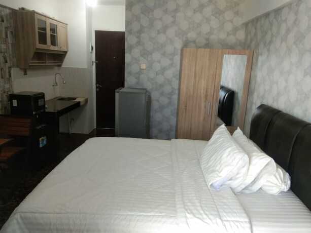 Imagen general del Hotel Apartemen Mutiara Bekasi By Veeroom. Foto 11