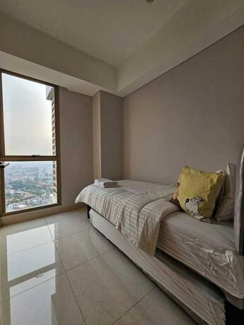Imagen de la habitación del Hotel Apartemen Taman Anggrek. Foto 13