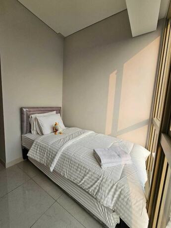 Imagen de la habitación del Hotel Apartemen Taman Anggrek. Foto 15