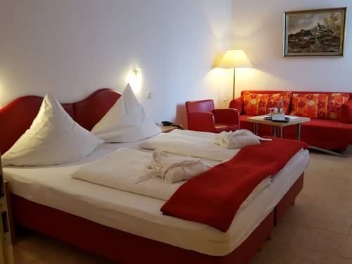 Imagen de la habitación del Hotel Aparthotel Am Kurpark. Foto 9