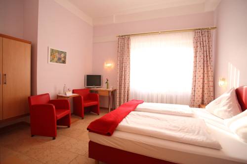 Imagen de la habitación del Hotel Aparthotel Am Kurpark. Foto 11
