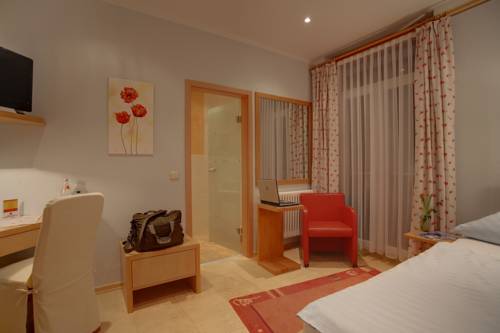 Imagen de la habitación del Hotel Aparthotel Am Kurpark. Foto 12