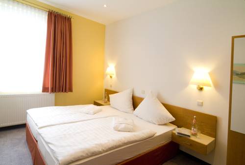 Imagen de la habitación del Hotel Aparthotel Am Kurpark. Foto 16