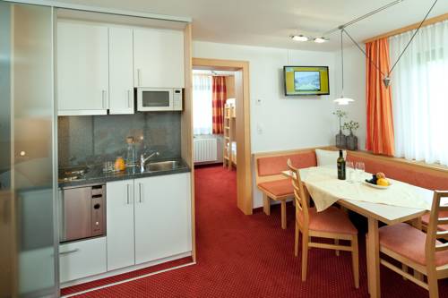 Imagen de la habitación del Hotel Aparthotel Brunnenhof. Foto 13