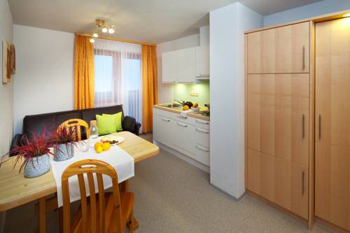 Imagen de la habitación del Hotel Aparthotel Brunnenhof. Foto 16