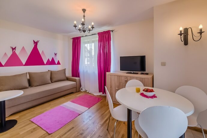 Imagen de la habitación del Hotel Aparthotel Delta Bialka. Foto 17