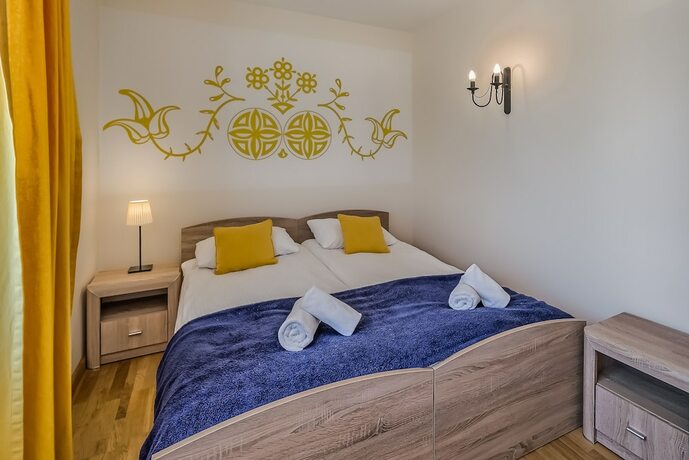 Imagen de la habitación del Hotel Aparthotel Delta Bialka. Foto 18