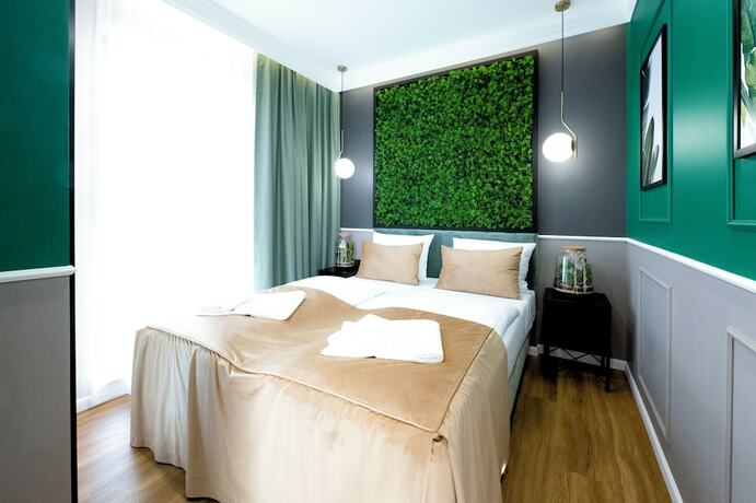 Imagen de la habitación del Hotel Aparthotel Green Concrete. Foto 14