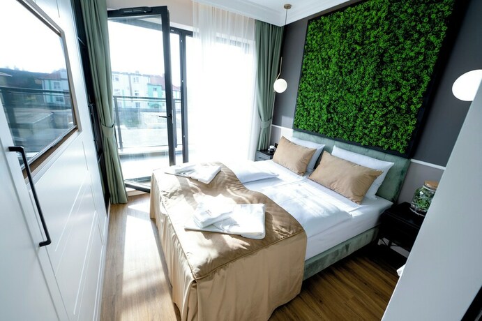 Imagen de la habitación del Hotel Aparthotel Green Concrete. Foto 20