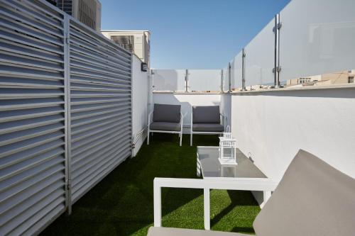 Imagen de la habitación del Hotel Apart-hotel Happy Life. Foto 11