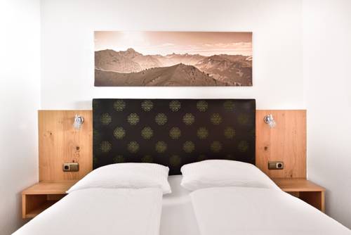 Imagen de la habitación del Hotel Aparthotel Kleinwalsertal. Foto 6