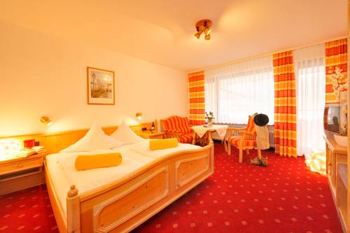 Imagen de la habitación del Hotel Aparthotel Kleinwalsertal. Foto 10