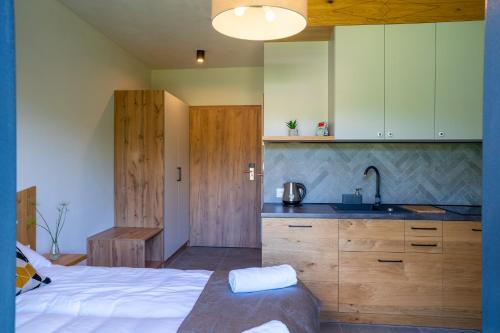 Imagen de la habitación del Hotel Aparthotel Pod Stokiem z sauną i jacuzzi - szczyrkapartamenty. Foto 14