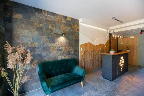 Imagen de la habitación del Hotel Aparthotel Pod Stokiem z sauną i jacuzzi - szczyrkapartamenty. Foto 18