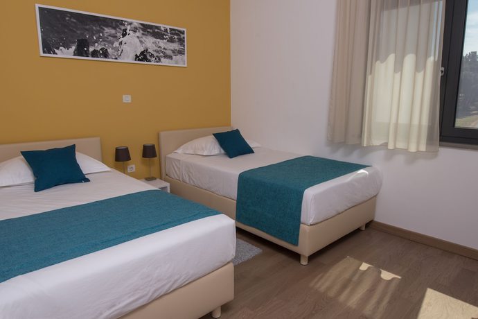 Imagen de la habitación del Hotel Aparthotel Punta Blu. Foto 10
