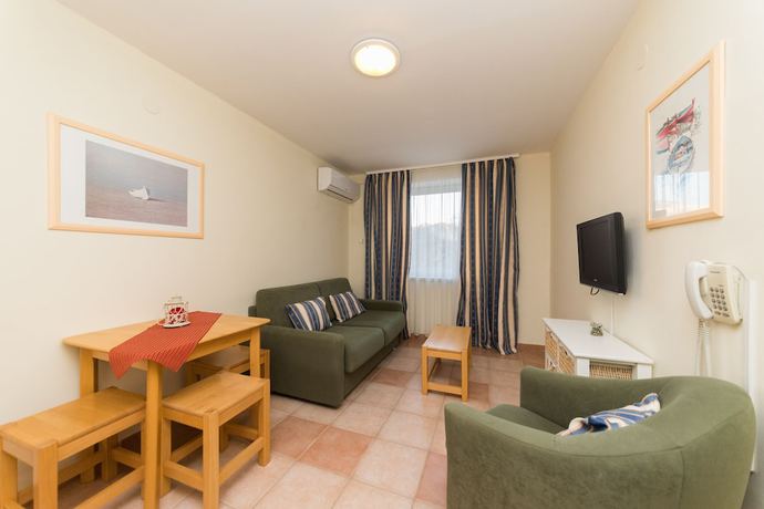 Imagen de la habitación del Hotel Aparthotel Roccia. Foto 4