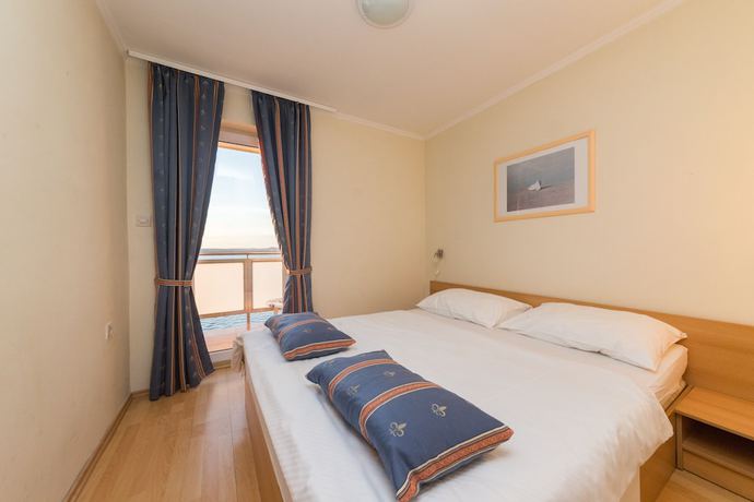 Imagen de la habitación del Hotel Aparthotel Roccia. Foto 6