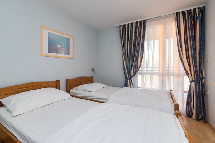 Imagen de la habitación del Hotel Aparthotel Roccia. Foto 7