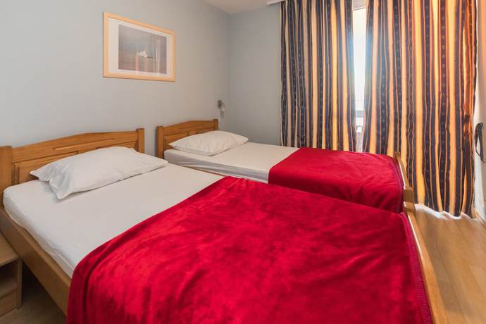 Imagen de la habitación del Hotel Aparthotel Roccia. Foto 9